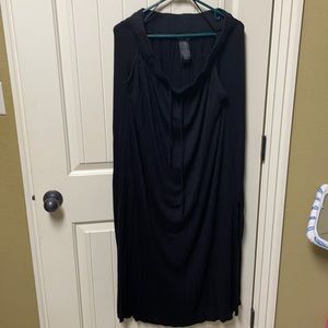 Long black skirt with pockets. Stretchy.